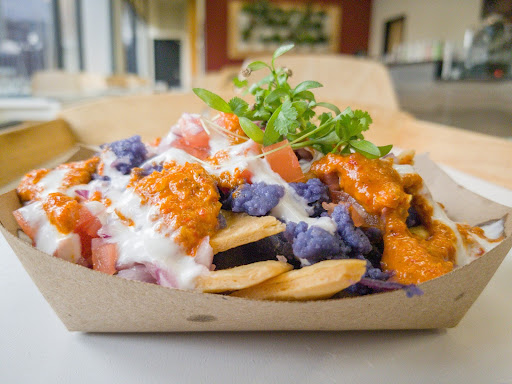 A flavorful pan-Asian dish featuring fresh vegetables, premium proteins, and aromatic herbs like cilantro and ginger.